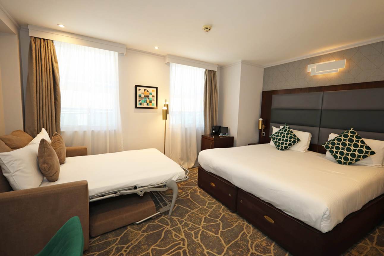 Executive King And Sofa Room